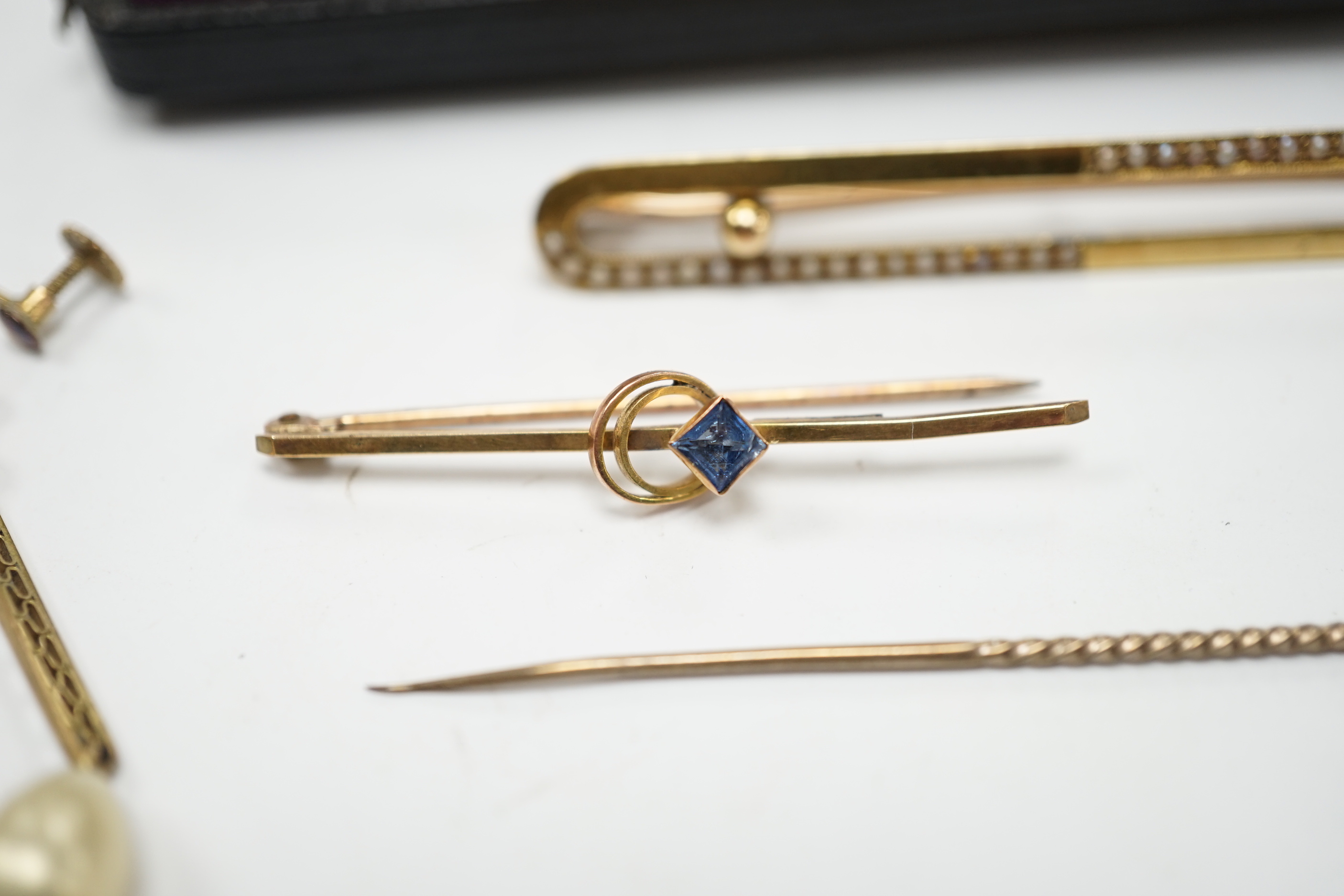 An Edwardian 15ct and seed pearl set bar brooch, 64mm, gross 4.9 grams, a 9ct bar brooch, two stick pins and a pair of 9ct and simulated pearl set drop earrings.
